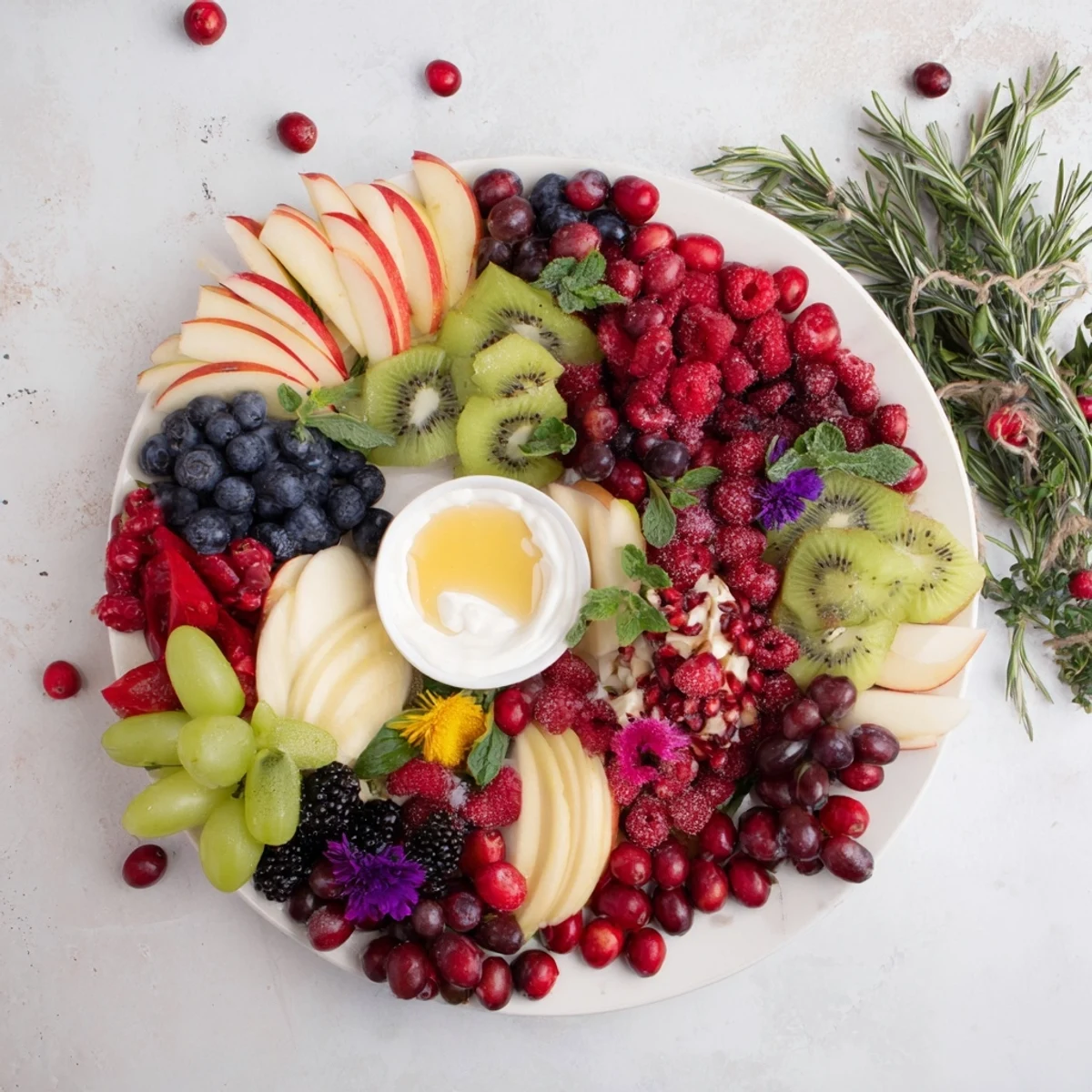 Vibrant Winter Berry Wreath Fruit Board displaying fresh, jewel-toned berries perfect for a holiday appetizer.
