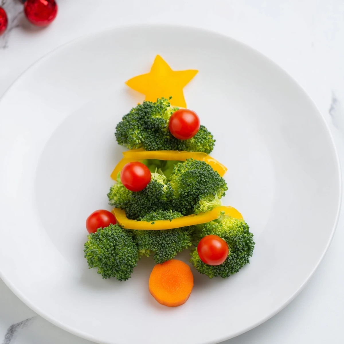 Festive Broccoli Tree with Cherry Tomato ornaments, a healthy veggie appetizer ready to serve.