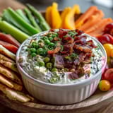 Creamy whipped cottage cheese ranch dip served with crisp, fresh vegetable sticks for a protein-rich appetizer.  