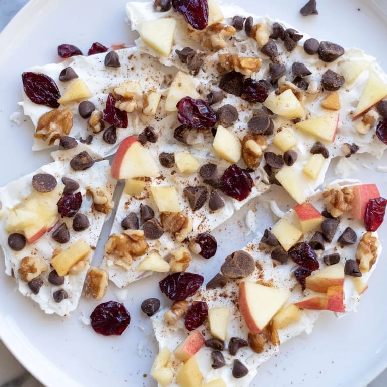 Creamy Greek yogurt layered with apple, nuts, and cinnamon creates a beautiful Apple Cinnamon Yogurt Bark.